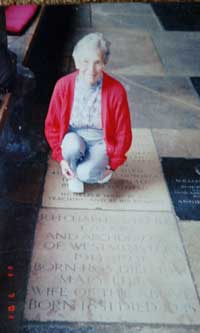 Photograph of granddaughter of Thomas Charles at grave of RH Chales at Westminster Abbey