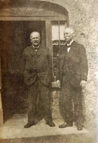 Photograph of William McWilliam & James Henry, solicitors, outside Holly Lodge